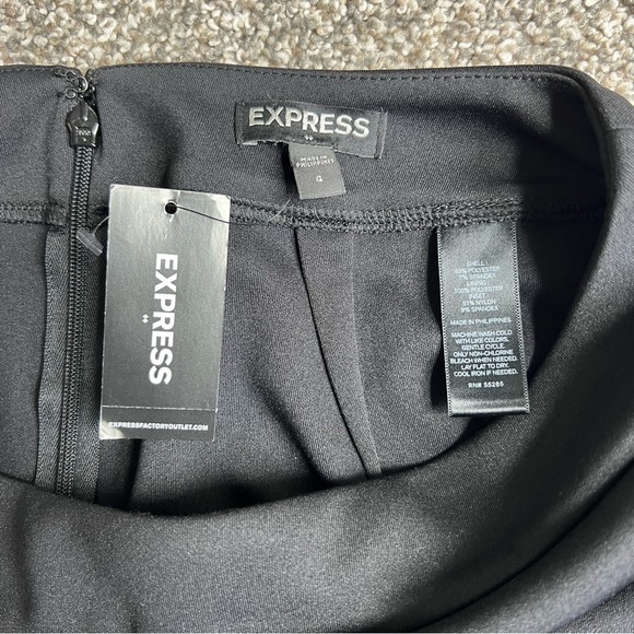 Express NWT Black Asymmetrical Cut Out Mini Skirt, Size 4 - Picture 3 of 6